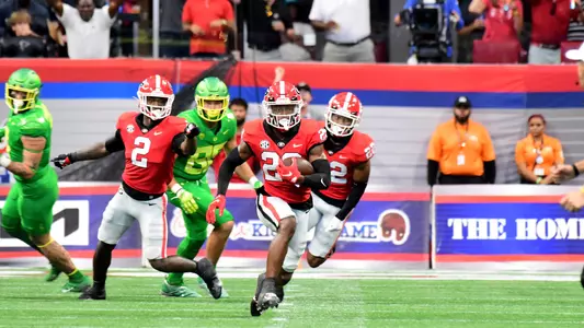 Georgia defensive back Christopher Smith (29) returns his interception 22 yards in the 2022 Chick-fil-a Kickoff Game played September 3rd in Atlanta, GA, at Mercedes-Benz Stadium. Photo credit Perry McIntyre.