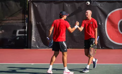 Georgia tennis players Trent Bryde and Ethan Quinn during the Southern Intercollegiate Championships against USC at the Dan Magill Tennis Complex in Athens, Ga., on Sunday, Sept. 18, 2022. (Photo by Kayla Renie)