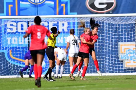 Dani Murguia and Madison Haugen celebrate Murguia's goal against Tennessee in the SEC Tournament quarterfinals.