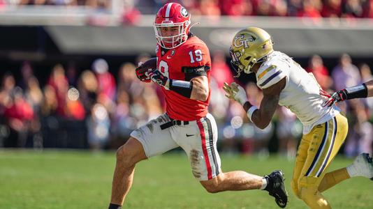 Nov 26, 2022; Athens, Georgia, USA; Georgia Bulldogs tight end Brock Bowers (19) runs after a catch against the Georgia Tech Yellow Jackets during the first half at Sanford Stadium. Mandatory Credit: Dale Zanine-USA TODAY Sports