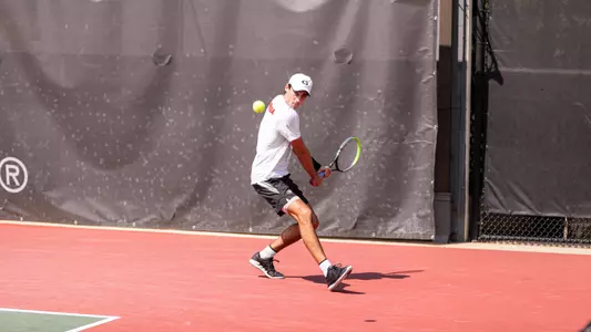 Paulsell preparing to hit a ball against Virginia at the 55th annual Southern Intercollegiate Championships.