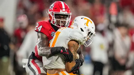 Nov 5, 2022; Athens, Georgia, USA; Georgia Bulldogs defensive back Malaki Starks (24) tackles Tennessee Volunteers wide receiver Jalin Hyatt (11) during the second half at Sanford Stadium. Mandatory Credit: Dale Zanine-USA TODAY Sports