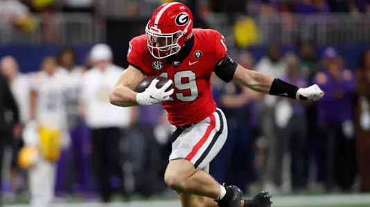 Georgia tight end Brock Bowers (19) moves the ball during the first half of the SEC Championship NCAA college football game between LSU and Georgia in Atlanta, on Saturday, Dec. 3, 2022.News Joshua L Jones