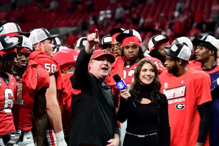 Georgia celebrates during the trophy presentation following the Bulldogsâ?? 50-30 win over LSU in the 2022 SEC Championship game played December 3, 2022, at Mercedes-Benz Stadium in Atlanta, GA. Photo credit Perry McIntyre.