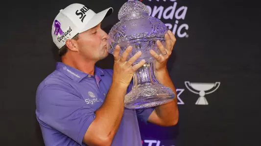 Feb 27, 2022; Palm Beach Gardens, Florida, USA; Sepp Straka kisses The Honda Classic trophy after winning The Honda Classic golf tournament. Mandatory Credit: Sam Navarro-USA TODAY Sports