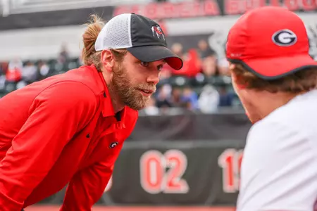 Georgia volunteer assistant coach Will Reynolds during a match against Florida at Dan McGill Tennis Complex in Athens, Ga., on Friday, March 11, 2022. (Photo by Mackenzie Miles)