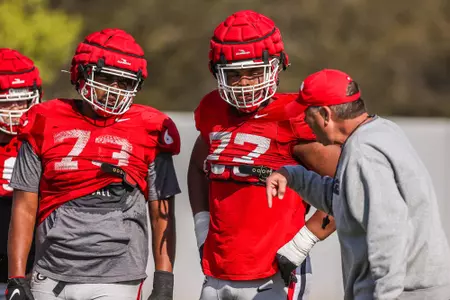 Georgia offensive lineman Xavier Truss (73) and Georgia offensive lineman Devin Willock (77) during the Bulldogs’ practice session in Athens, Ga., on Tuesday, March 29, 2022. (Photo by Mackenzie Miles)