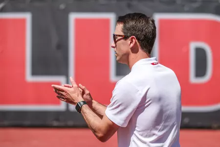Georgia associate head coach Jamie Hunt during a match against LSU at Dan McGill Tennis Complex in Athens, Ga., on Sunday, April 3, 2022. (Photo by Mackenzie Miles)