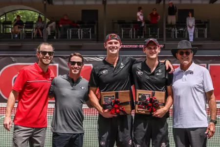 Georgia tennis player Tristan McCormick and Georgia tennis player Hamish Stewart during the senior day match between Georgia and Alabama at Dan McGill Tennis Stadium in Athens, Ga., on Sunday, April 17, 2022.(Photo by Mackenzie Miles)