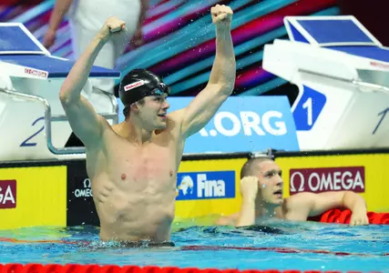 Nic Fink of the United States reacts after winning the Men 50m Breaststroke final at the 19th FINA World Championships in Budapest, Hungary, Tuesday, June 21, 2022. (AP Photo/Petr David Josek)