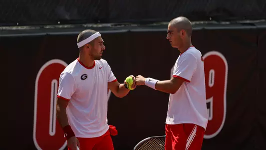 Georgia tennis players Filipe Costa and Teodor Giusca during the Southern Intercollegiate Championships against Texas at the Dan Magill Tennis Complex in Athens, Ga., on Friday, Sept. 16, 2022. (Photo by Kayla Renie)