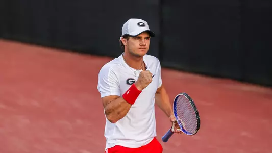 Georgia tennis player Trent Bryde during a match against Auburn at Dan MaGill Tennis Complex in Athens, Ga., on Friday, April 15, 2022. (Photo by Mackenzie Miles)