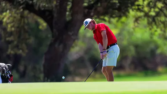 Connor Creasy chipping out of the bunker during the Valero Texas Collegiate.