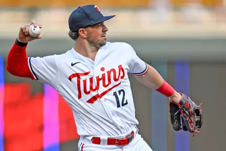 MINNEAPOLIS, MN - MAY 22: Minnesota Twins Infield Kyle Farmer (12) throws to first during a MLB game between the Minnesota Twins and San Francisco Giants on May 22, 2023, at Target Field in Minneapolis, MN.(Photo by Nick Wosika/Icon Sportswire via Getty Images)