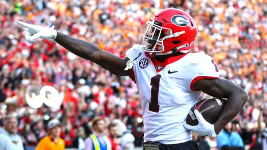 Nov 18, 2023; Knoxville, Tennessee, USA; Georgia Bulldogs wide receiver Marcus Rosemy-Jacksaint (1) reacts after catching a touchdown pass against the Tennessee Volunteers during the first half at Neyland Stadium. Mandatory Credit: Randy Sartin-USA
