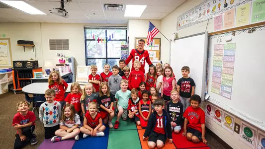 Student-athletes from the University of Georgia football team visited High Shoals Elementary School to read to students in Bishop, Ga., on Wednesday, April 19, 2023. (Tony Walsh/UGAAA)