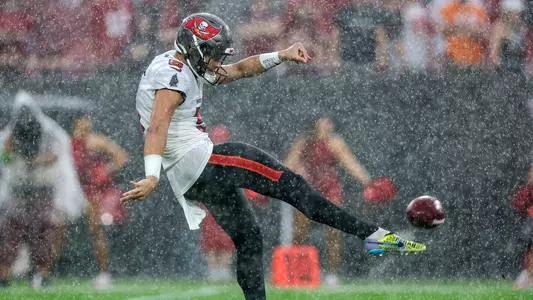 Former Bulldog Jake Camarda punting for the Tampa Bay Buccaneers during the team's home game during week 13.