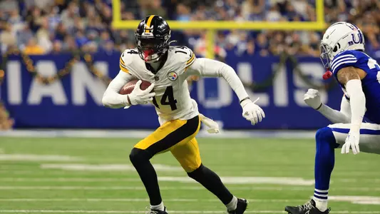 INDIANAPOLIS, INDIANA - DECEMBER 16: George Pickens #14 of the Pittsburgh Steelers runs the ball in the game against the Indianapolis Colts at Lucas Oil Stadium on December 16, 2023 in Indianapolis, Indiana. (Photo by Justin Casterline/Getty Images)