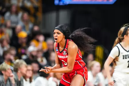 Diamond Battles (3) celebrates a made basket during the second round of the NCAA Tournament