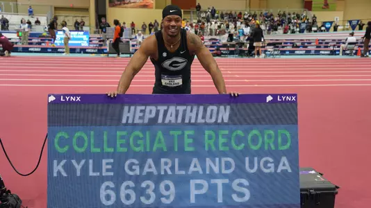 Mar 11, 2023; Albuquerque, New Mexico, USA; Kyle Garland of Georgia poses after winning the heptathlon in a collegiate record 6,639 points during the NCAA Indoor Championships at Albuquerque Convention Center. Mandatory Credit: Kirby Lee-USA TODAY Sports