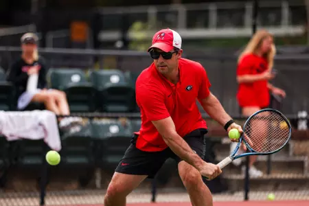 Georgia associate head coach Drake Bernstein before Georgia’s match against South Carolina at Henry Feild Stadium at the Dan Magill Tennis Complex in Athens, Ga., on Thursday, April 6, 2023. (Tony Walsh/UGAAA)