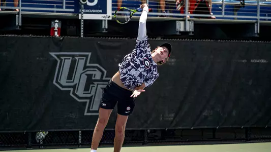 Ethan Quinn serving during the team's NCAA Championship quarterfinal match against Ohio State on May 19, 2023.