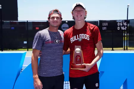 Ethan Quinn of The University of Georgia poses for a photo with the singles champion trophy after winning the 2023 NCAA Division I Men’s Tennis Championship Singles Finals at the USTA National Campus in Orlando, Florida on Saturday, May 27, 2023. (Photo by Manuela Davies/USTA)
