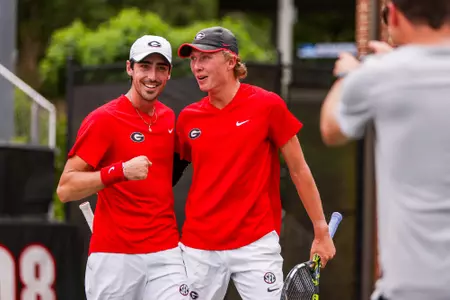 Thomas Paulsell and Ethan Quinn celebrate after winning their match at No. 1 doubles on Sunday, May 7, 2023.