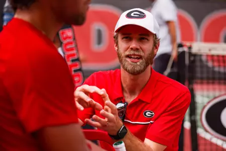 Georgia volunteer assistant coach Will Reynolds during Georgia’s second round match of the 2023 NCAA Division I men’s tennis championship against Oklahoma at Henry Feild Stadium inside the Dan Magill Tennis Complex in Athens, Ga., on Sunday, May 7, 2023. (Tony Walsh/UGAAA)