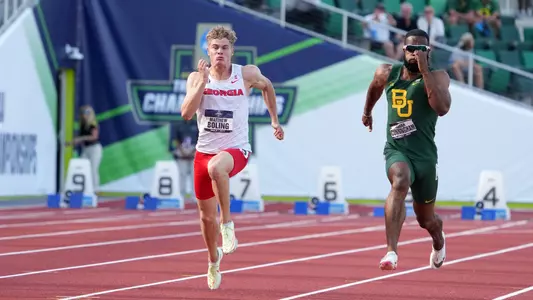 Jun 8, 2022; Eugene, OR, USA; Matthew Boling of Georgia (left) and Isaiah Cunningham of Baylor run in a 100m heat during the NCAA Track and Field championships at Hayward Field. Mandatory Credit: Kirby Lee-USA TODAY Sports