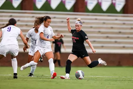 Georgia midfielder Summer Denigan takes a shot against Furman in exhibition play Tuesday evening at Stone Stadium.