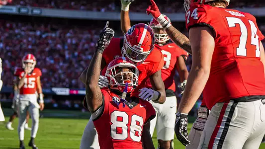 Georgia Bulldogs wide receiver Dillon Bell (86) reacts with teammates after catching a touchdown pass against the Mississippi State Bulldogs during the first half at Sanford Stadium. Mandatory Credit: Dale Zanine-Imagn Images