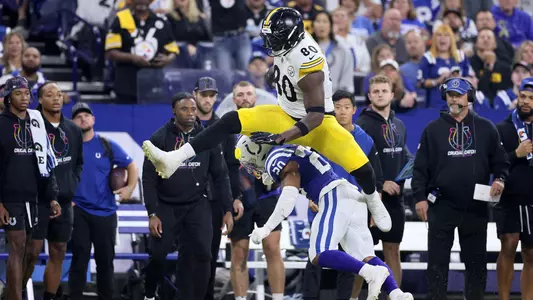 INDIANAPOLIS, INDIANA - SEPTEMBER 29: Darnell Washington (80) of the Pittsburgh Steelers hurdles Nick Cross (20) of the Indianapolis Colts during the first half at Lucas Oil Stadium on September 29, 2024 in Indianapolis, Indiana. (Photo by Andy Lyons/Getty Images)