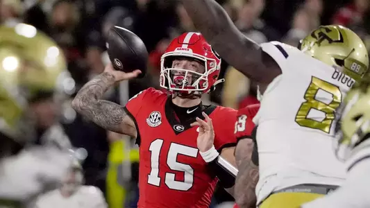 Georgia quarterback Carson Beck (15) throws the ball during the first half of a NCAA college football game against Georgia Tech in Athens, Ga., on Friday, Nov. 29, 2024.