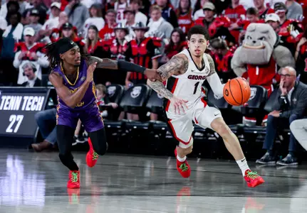 Dakota Leffew dribbles against Tennessee Tech