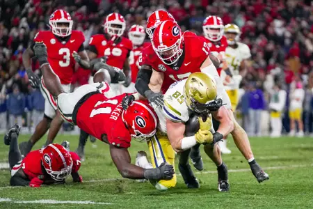 Georgia inside linebacker Jalon Walker (11), Georgia defensive back Dan Jackson (17) during Georgia’s game against Georgia Tech on Dooley Field at Sanford Stadium in Athens, Ga., on Friday, Nov. 29, 2024. (Tony Walsh/UGAAA)