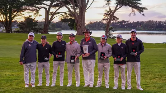 The Georgia men's golf team posing together after winning The Goodwin in San Francisco.