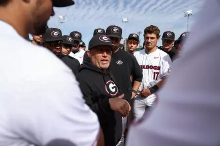 Ike Cousins Head Baseball Coach Wes Johnson after Georgia’s game against Alabama at Foley Field in Athens, Ga., on Sunday, Mar. 24, 2024. (Kari Hodges/UGAAA)