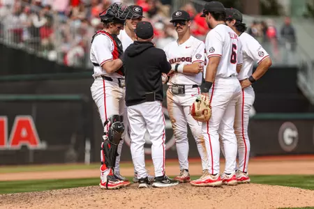 Georgia catcher Henry Hunter (11), Georgia infielder Slate Alford (44), Georgia infielder Kolby Branch (9), Georgia infielder Sebastian Murillo (2), Georgia catcher and outfielder Corey Collins (6), Ike Cousins Head Baseball Coach Wes Johnson during Georgia’s game against Alabama at Foley Field in Athens, Ga., on Sunday, Mar. 24, 2024. (Kari Hodges/UGAAA)
