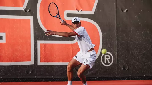 Filipe Costa retuning a shot during the team's match against The Citadel.
