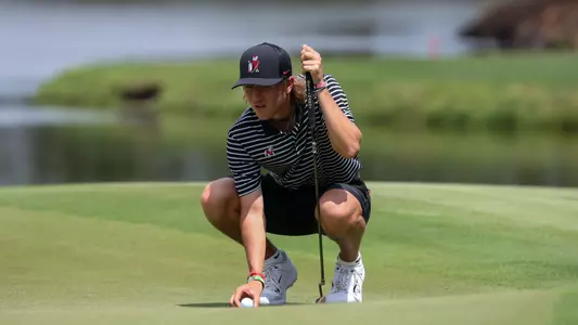 Freshman Camden Smith lines up a putt during the SEC Championships in St Simons Island, Ga.