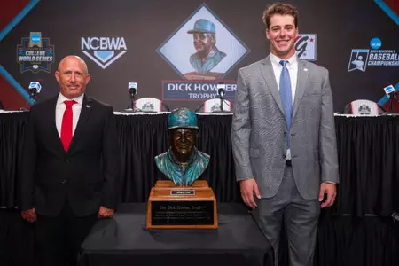 Charlie Condon and Ike Cousins Head Baseball Coach Wes Johnson during the Dick Howser Award Press Conference at Charles Schwab Field in Omaha, Ne., on Friday, June 14, 2024. (Kari Hodges/UGAAA)