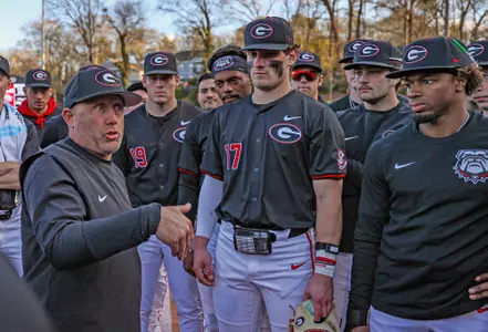 Ike Cousins Head Baseball Coach Wes Johnson after Georgia’s game against Northern Kentucky at Foley Field in Athens, Ga., on Friday, Feb. 23, 2024. (Kari Hodges/UGAAA)