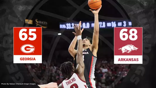Jan 22, 2025; Fayetteville, Arkansas, USA; Georgia Bulldogs forward RJ Godfrey (10) shots over Arkansas Razorbacks forward Zvonimir Ivisic (44) during the first half at Bud Walton Arena. Mandatory Credit: Nelson Chenault-Imagn Images