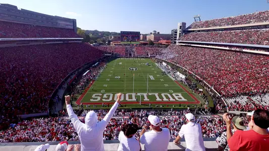 Athens, Georgia, USA; Fans cheer during the kickoff during the first quarter of the game between the Mississippi Rebels and the Georgia Bulldogs at Sanford Stadium. Mandatory Credit: Brett Davis-Imagn Images