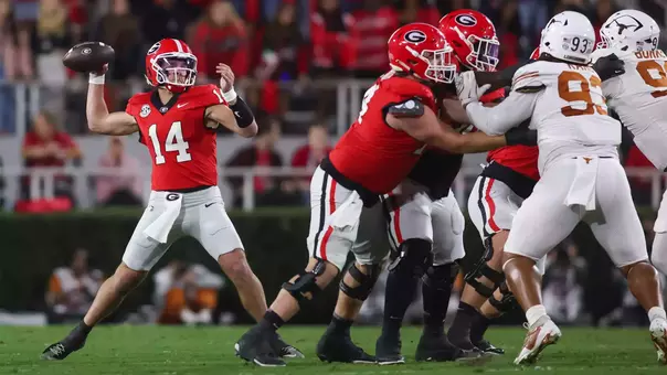 Nov 15, 2025; Athens, Georgia, USA; Georgia Bulldogs quarterback Gunner Stockton (14) throws a pass in the first half against the Texas Longhorns at Sanford Stadium. Mandatory Credit: Brett Davis-Imagn Images