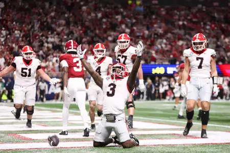Dec 6, 2025; Atlanta, GA, USA; Georgia Bulldogs running back Nate Frazier (3) celebrates after scoring a touchdown during the third quarter against the Alabama Crimson Tide during the 2025 SEC Championship game at Mercedes-Benz Stadium. Mandatory Credit: Brett Davis-Imagn Images