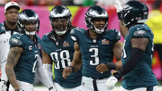 NEW ORLEANS, LOUISIANA - FEBRUARY 09: Darius Slay Jr. #2, Jalen Carter #98, Nolan Smith Jr. #3, and Milton Williams #93 of the Philadelphia Eagles celebrate in the first quarter against the Kansas City Chiefs during Super Bowl LIX at Caesars Superdome on February 09, 2025 in New Orleans, Louisiana. (Photo by Emilee Chinn/Getty Images)