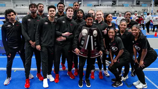 Georgia head coach Caryl Smith Gilbert, Georgia men’s and women’s track teams after the 2025 NCAA DI Indoor Track & Field Championships at the Virginia Beach Sports Center in Virginia Beach, Va., on Saturday, March 15, 2025. (Tony Walsh/UGAAA)