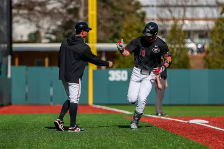 Georgia infielder/outfielder Ryland Zaborowski (20), Georgia assistant coach Brock Bennett during Georgia’s game against Columbia at Foley Field in Athens, Ga., on Friday, March 7, 2025. (Conor Dillon/UGAAA)